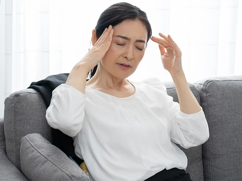 Asian middle-aged woman who is suffering from POTS
